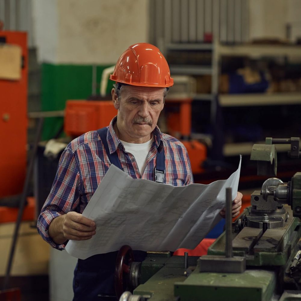 engineer-examining-the-blueprint-1.jpg